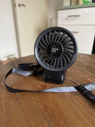 JISULIFE Handheld Fan Life7 – Ultimate Flexibility: High-Power Motor. LED Display. 19.5 Hrs Cooling. 5000mAh Rechargeable. 5-Speed. Foldable Design. 3-IN-1 Portable Fan for Travel Cruise Beach(Grey) photo review