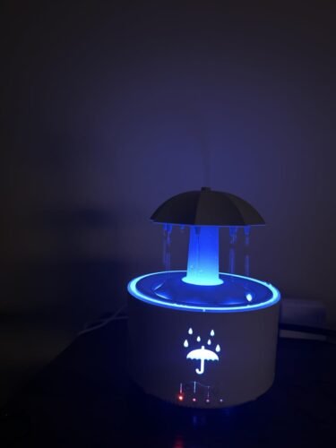 Rain Umbrella Humidifier & Aroma Diffuser with Soothing Rain Sounds. Water Drip Effect. 7 Colors Mood Light. Timer and Auto-Off. Ideal for Relaxation. Sleep. Home. Bedroom. Desk(white) photo review