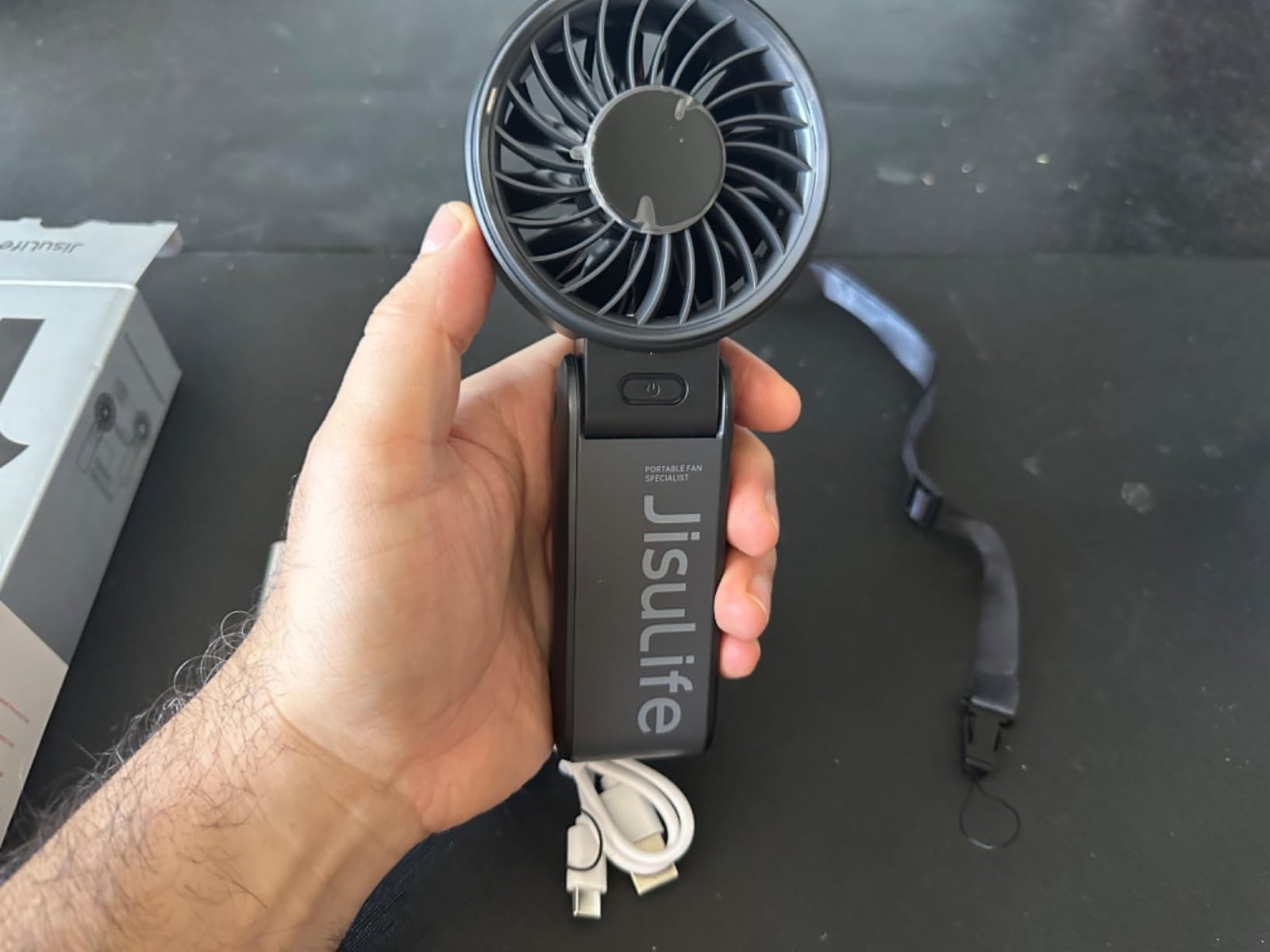 JISULIFE Handheld Fan Life7 – Ultimate Flexibility: High-Power Motor. LED Display. 19.5 Hrs Cooling. 5000mAh Rechargeable. 5-Speed. Foldable Design. 3-IN-1 Portable Fan for Travel Cruise Beach(Grey) photo review