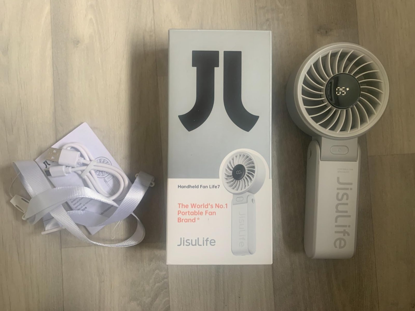 JISULIFE Handheld Fan Life7 – Ultimate Flexibility: High-Power Motor. LED Display. 19.5 Hrs Cooling. 5000mAh Rechargeable. 5-Speed. Foldable Design. 3-IN-1 Portable Fan for Travel Cruise Beach(Grey) photo review