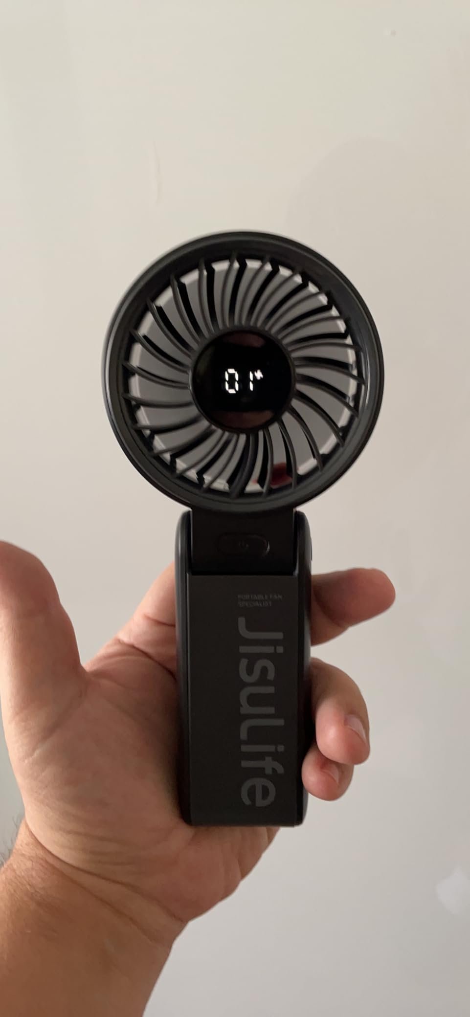 JISULIFE Handheld Fan Life7 – Ultimate Flexibility: High-Power Motor. LED Display. 19.5 Hrs Cooling. 5000mAh Rechargeable. 5-Speed. Foldable Design. 3-IN-1 Portable Fan for Travel Cruise Beach(Grey) photo review