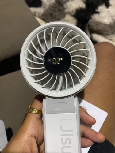 JISULIFE Handheld Fan Life7 – Ultimate Flexibility: High-Power Motor. LED Display. 19.5 Hrs Cooling. 5000mAh Rechargeable. 5-Speed. Foldable Design. 3-IN-1 Portable Fan for Travel Cruise Beach(Grey) photo review