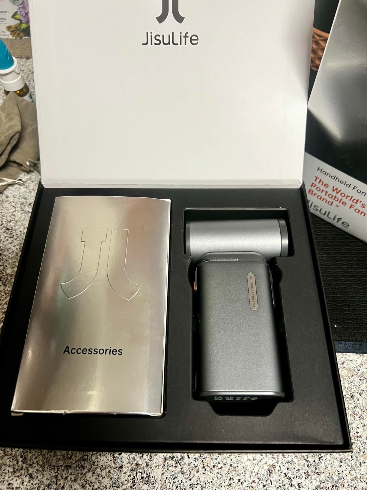 JISULIFE Portable Handheld Turbo Fan. 100 Speeds Adjustable Mini Personal Fan. 9000mAh USB Rechargeable Battery Operated. LED Display. Metal Shell with Accessories Gifts for Men Women Travel- Grey photo review