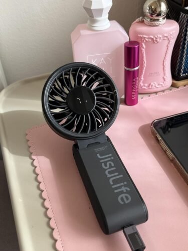 JISULIFE Handheld Fan Life7 – Ultimate Flexibility: High-Power Motor. LED Display. 19.5 Hrs Cooling. 5000mAh Rechargeable. 5-Speed. Foldable Design. 3-IN-1 Portable Fan for Travel Cruise Beach(Grey) photo review