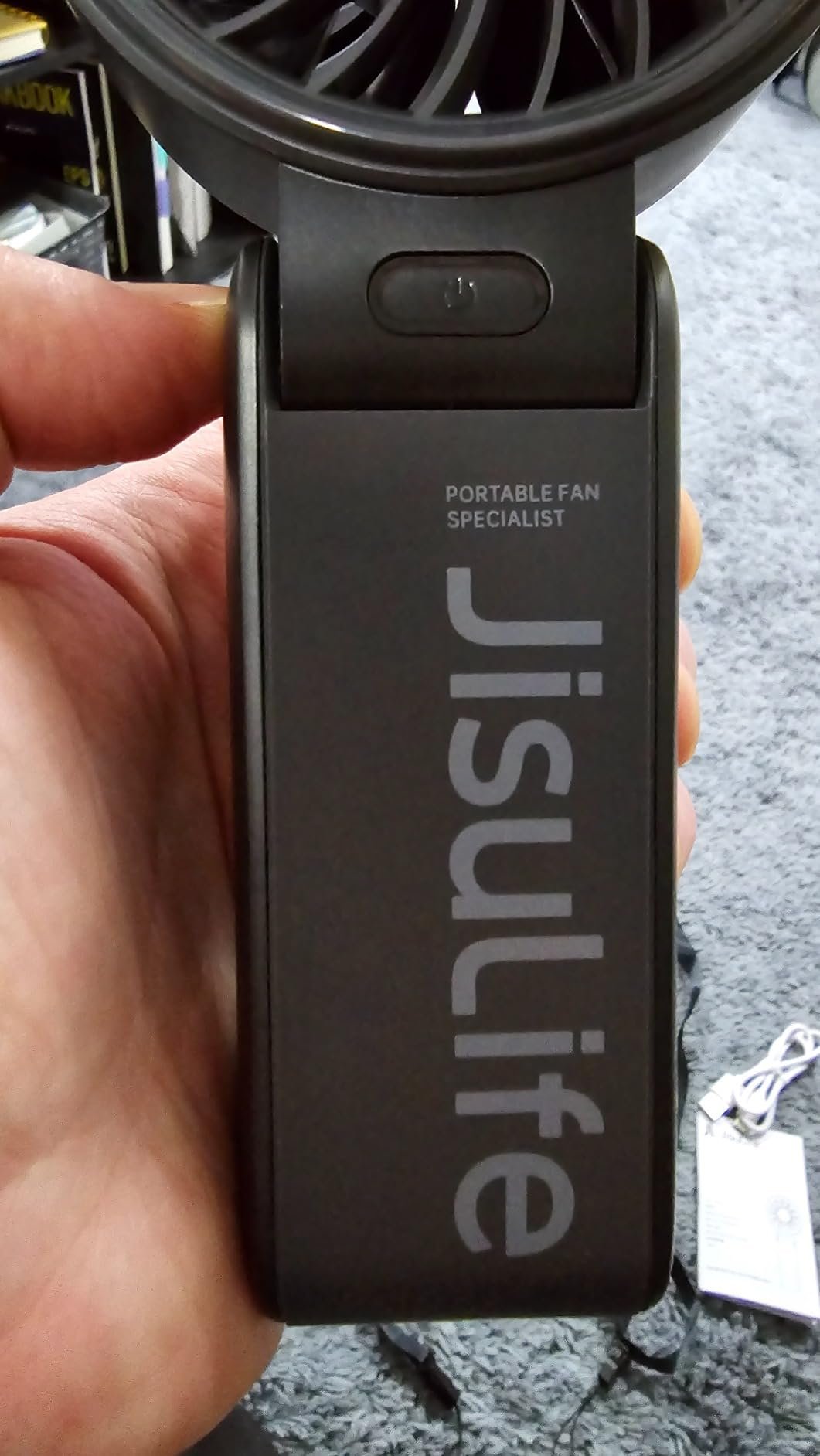 JISULIFE Handheld Fan Life7 – Ultimate Flexibility: High-Power Motor. LED Display. 19.5 Hrs Cooling. 5000mAh Rechargeable. 5-Speed. Foldable Design. 3-IN-1 Portable Fan for Travel Cruise Beach(Grey) photo review