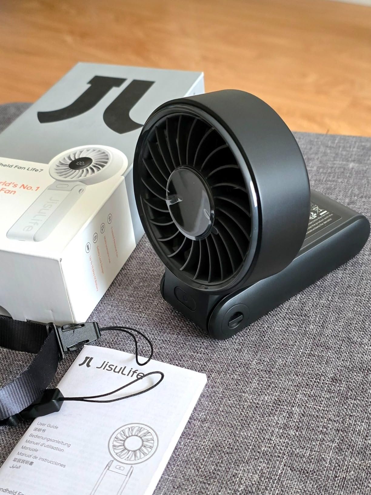 JISULIFE Handheld Fan Life7 – Ultimate Flexibility: High-Power Motor. LED Display. 19.5 Hrs Cooling. 5000mAh Rechargeable. 5-Speed. Foldable Design. 3-IN-1 Portable Fan for Travel Cruise Beach(Grey) photo review