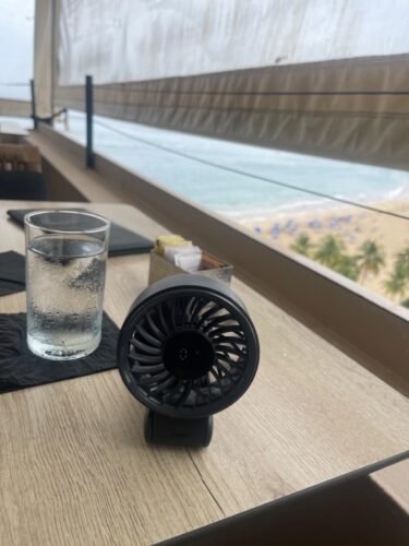 JISULIFE Handheld Fan Life7 – Ultimate Flexibility: High-Power Motor. LED Display. 19.5 Hrs Cooling. 5000mAh Rechargeable. 5-Speed. Foldable Design. 3-IN-1 Portable Fan for Travel Cruise Beach(Grey) photo review