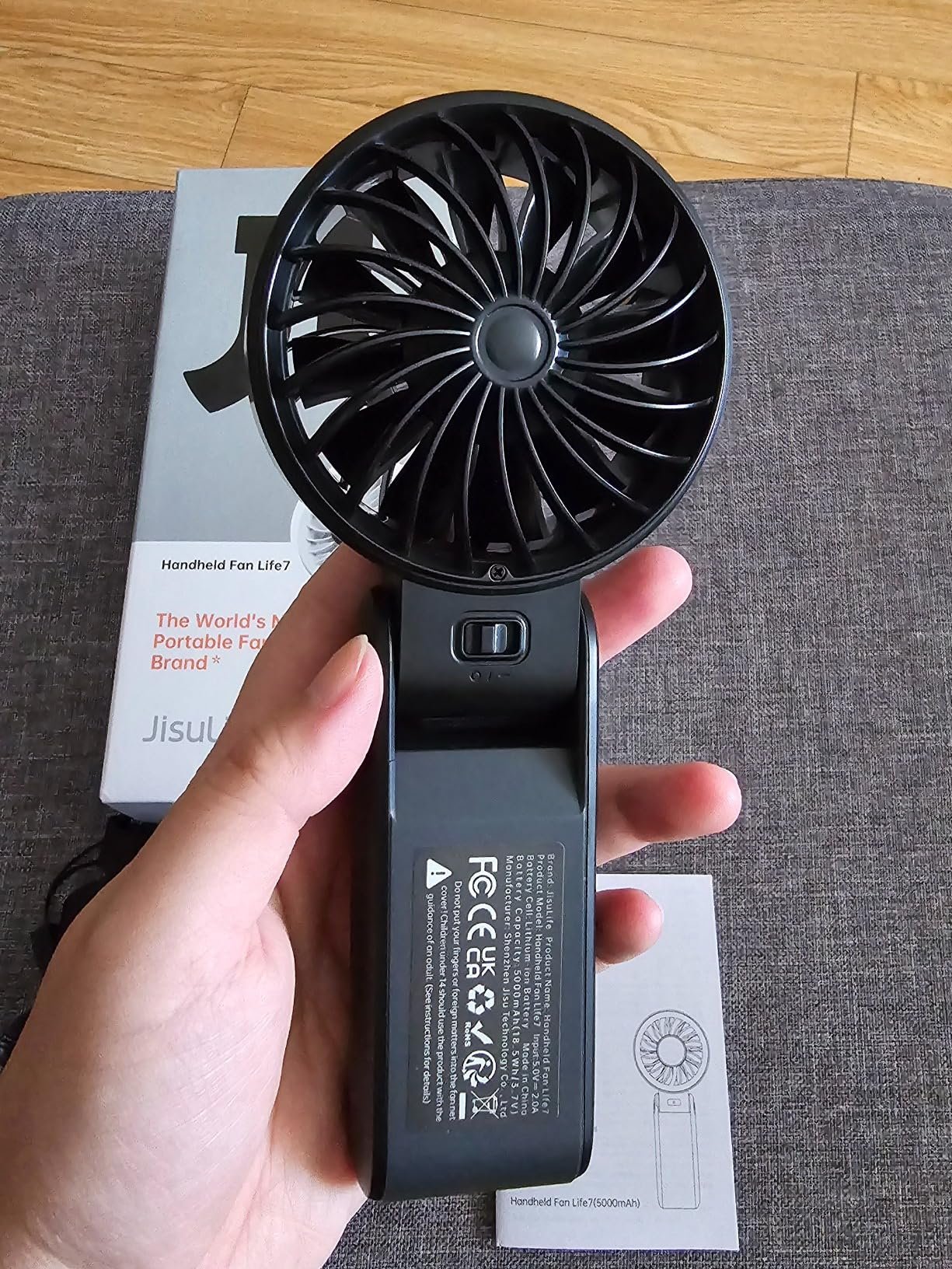 JISULIFE Handheld Fan Life7 – Ultimate Flexibility: High-Power Motor. LED Display. 19.5 Hrs Cooling. 5000mAh Rechargeable. 5-Speed. Foldable Design. 3-IN-1 Portable Fan for Travel Cruise Beach(Grey) photo review