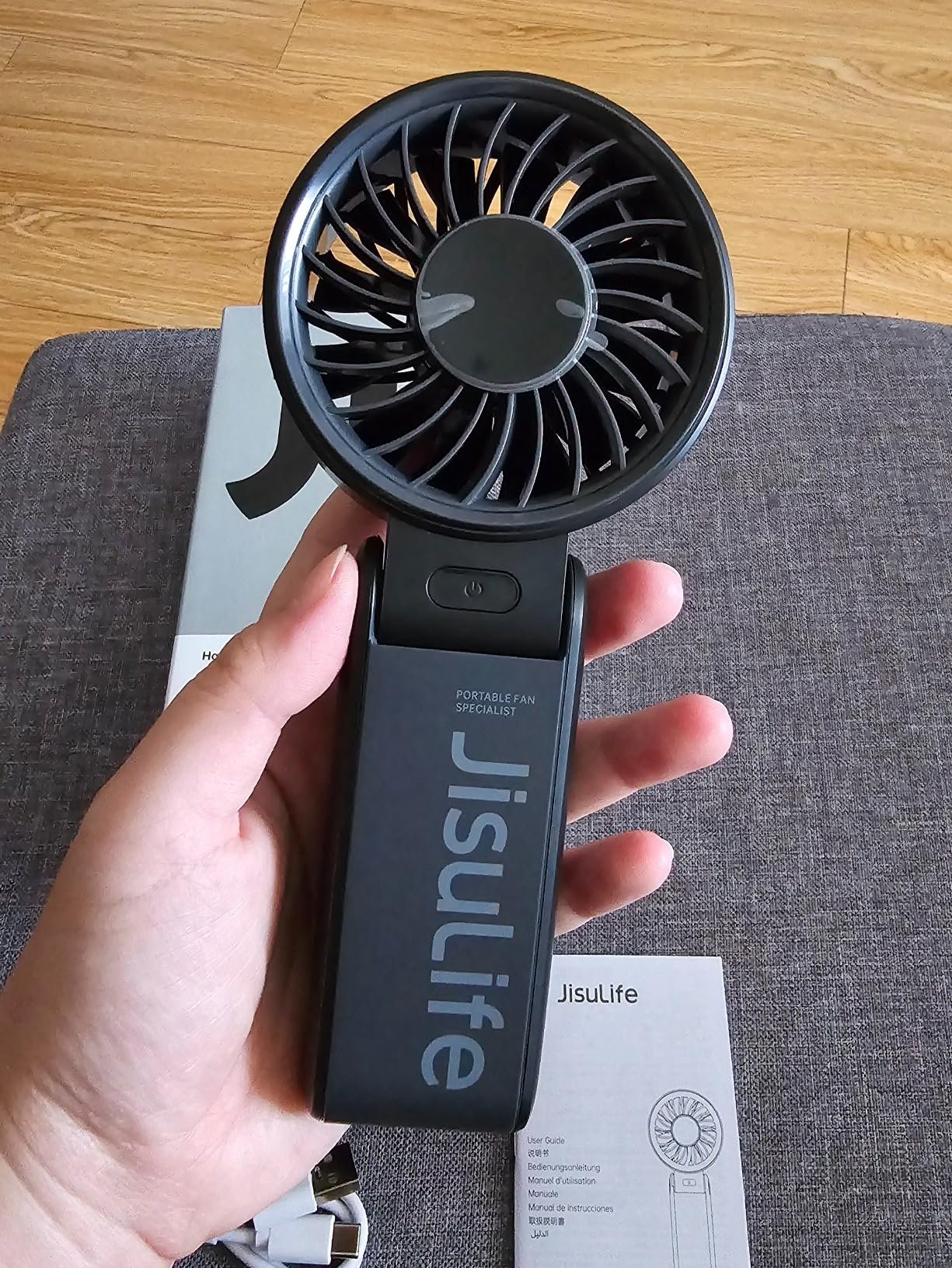JISULIFE Handheld Fan Life7 – Ultimate Flexibility: High-Power Motor. LED Display. 19.5 Hrs Cooling. 5000mAh Rechargeable. 5-Speed. Foldable Design. 3-IN-1 Portable Fan for Travel Cruise Beach(Grey) photo review
