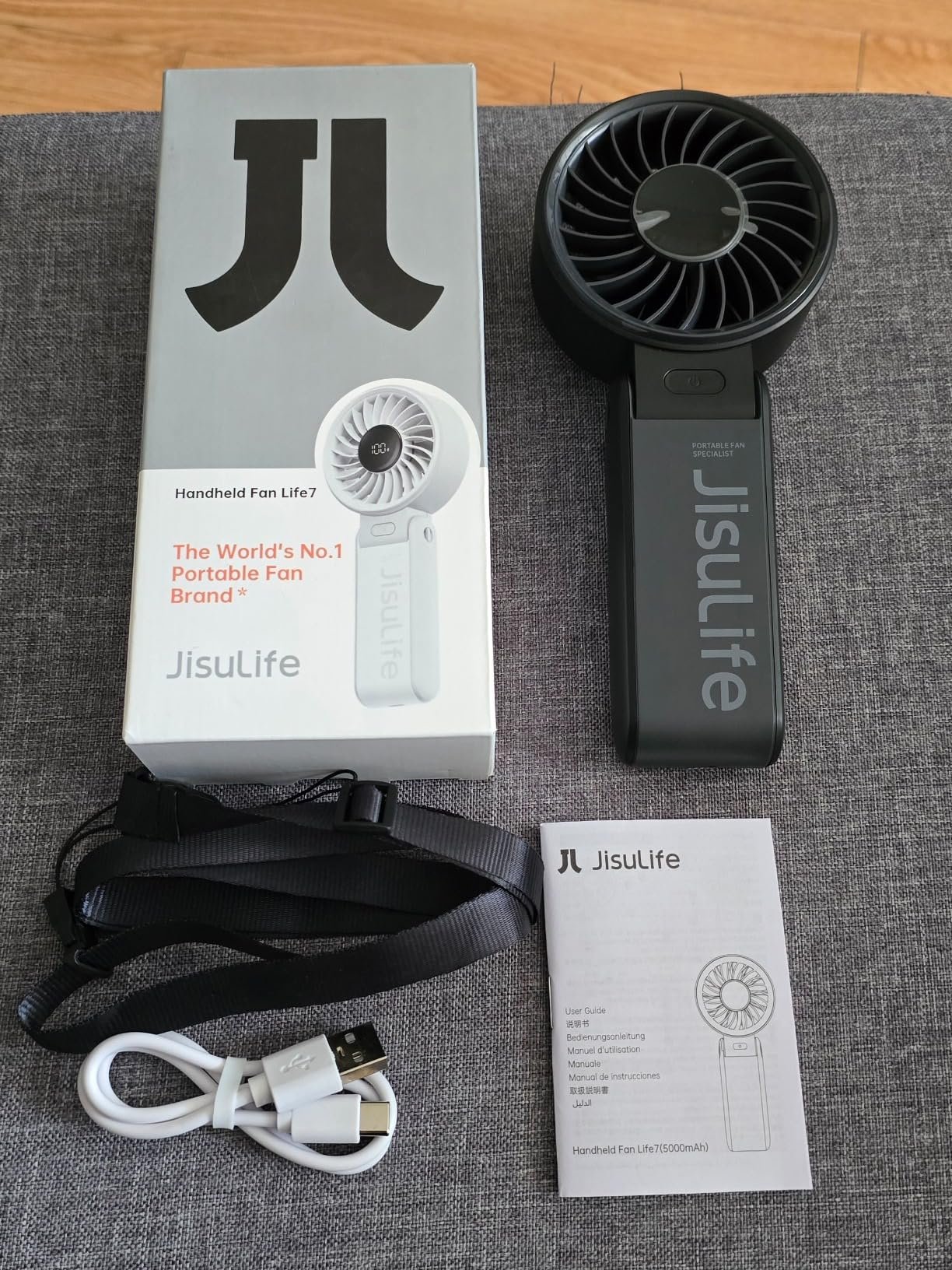 JISULIFE Handheld Fan Life7 – Ultimate Flexibility: High-Power Motor. LED Display. 19.5 Hrs Cooling. 5000mAh Rechargeable. 5-Speed. Foldable Design. 3-IN-1 Portable Fan for Travel Cruise Beach(Grey) photo review