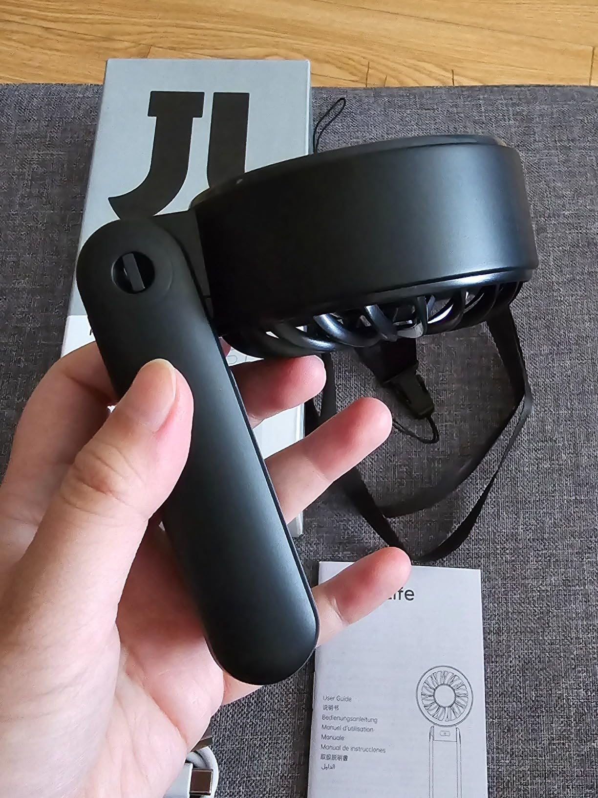 JISULIFE Handheld Fan Life7 – Ultimate Flexibility: High-Power Motor. LED Display. 19.5 Hrs Cooling. 5000mAh Rechargeable. 5-Speed. Foldable Design. 3-IN-1 Portable Fan for Travel Cruise Beach(Grey) photo review