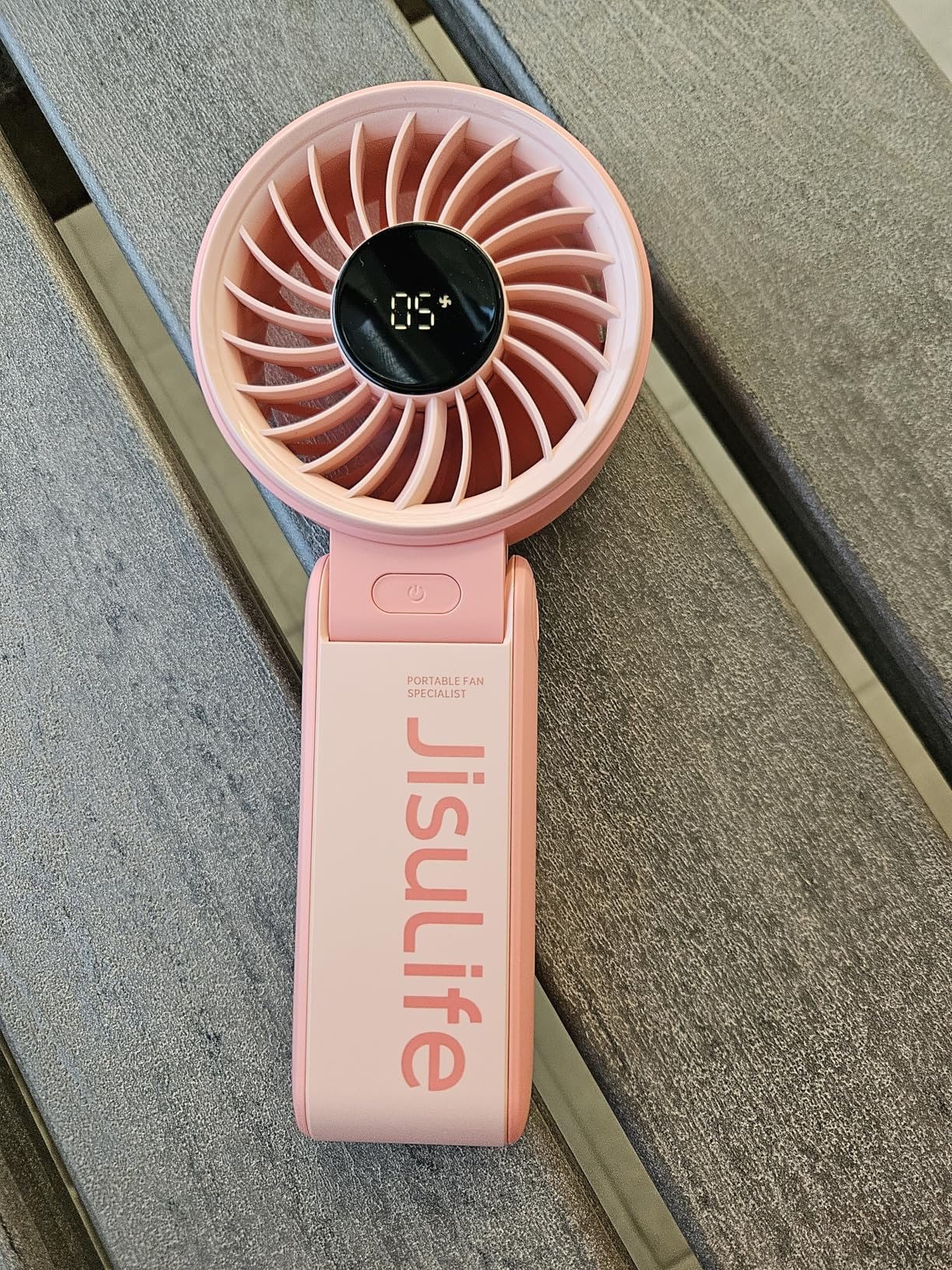 JISULIFE Handheld Fan Life7 – Ultimate Flexibility: High-Power Motor. LED Display. 19.5 Hrs Cooling. 5000mAh Rechargeable. 5-Speed. Foldable Design. 3-IN-1 Portable Fan for Travel Cruise Beach(Grey) photo review