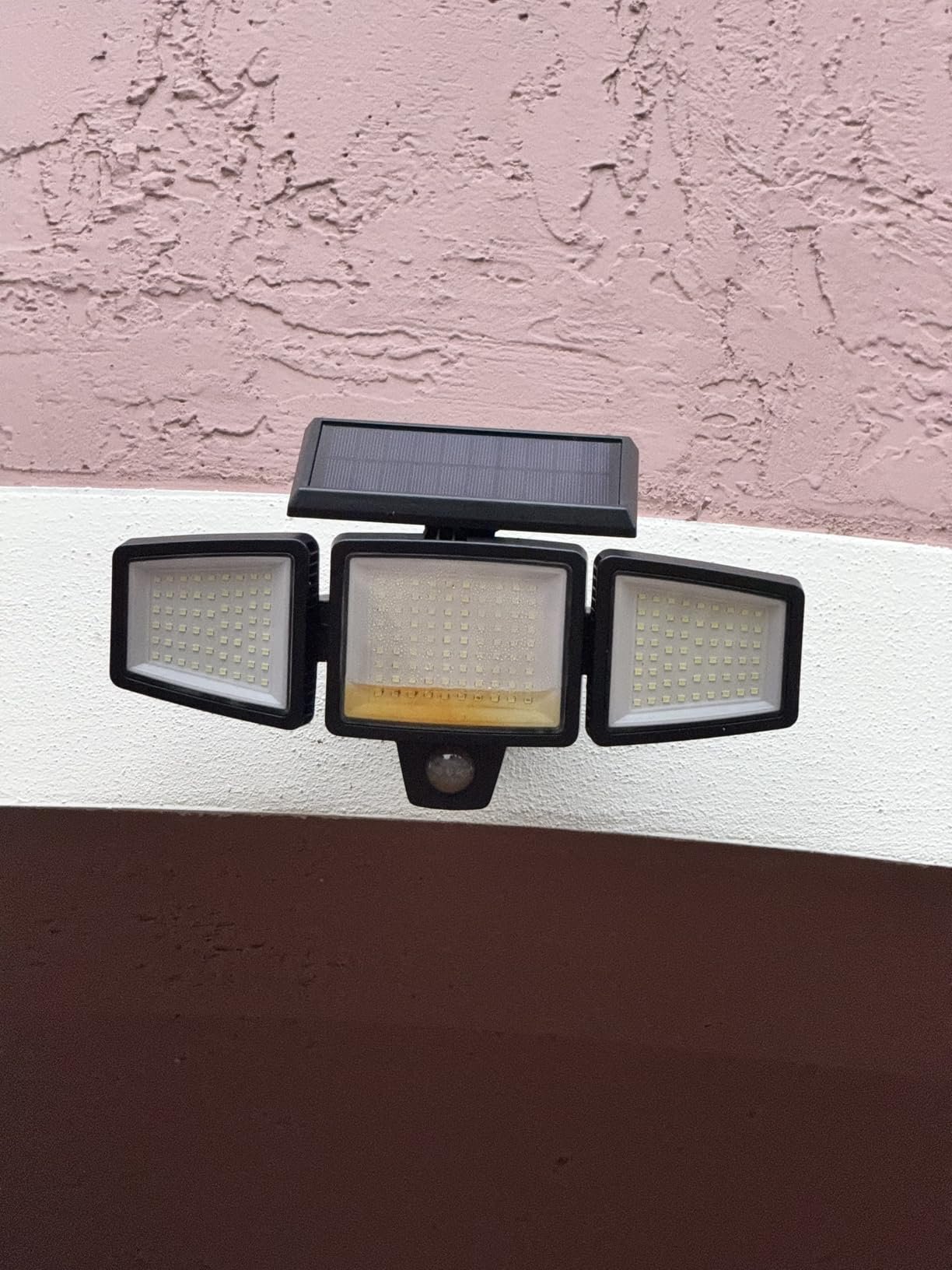 Tuffenough Solar Outdoor Lights 2500LM 210 LED Security Lights with Remote Control.3 Heads Motion Sensor Lights. IP65 Waterproof.270° Wide Angle Flood Wall Lights with 3 Modes(2 Packs) photo review
