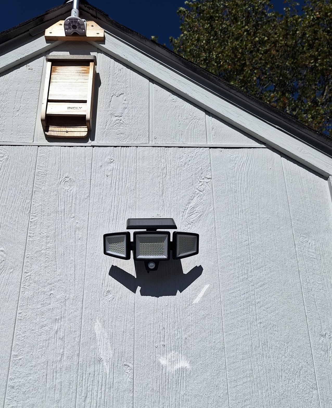 Tuffenough Solar Outdoor Lights 2500LM 210 LED Security Lights with Remote Control.3 Heads Motion Sensor Lights. IP65 Waterproof.270° Wide Angle Flood Wall Lights with 3 Modes(2 Packs) photo review